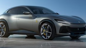 A gray 2024 Ferrari Purosangue small luxury performance SUV.