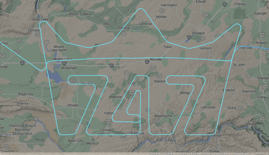 The last 747 flight path on a map shows "747" underneath a crown
