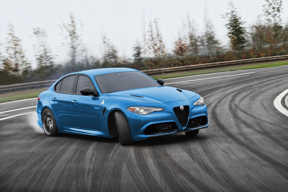 The Alfa Romeo Giulia in blue, drifting around a track