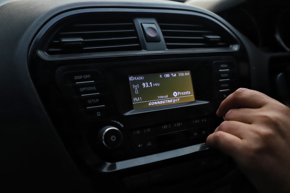 close up of an AM Radio in a car. 