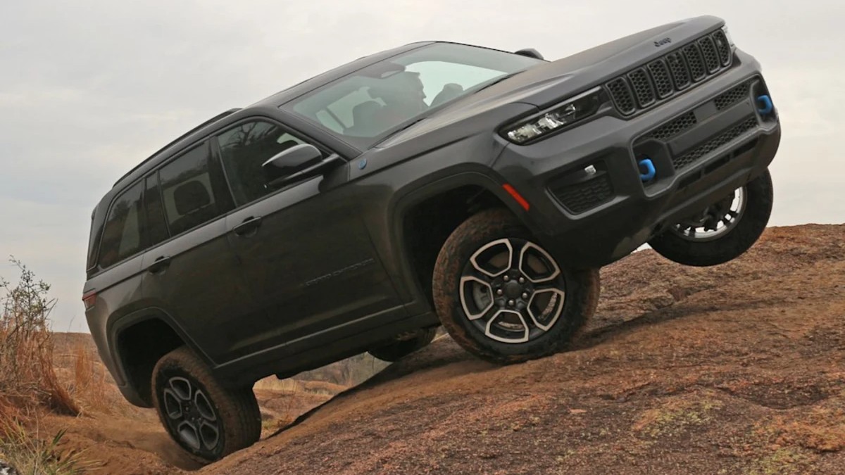 Black 2023 Jeep Grand Cherokee on a Rough Trail