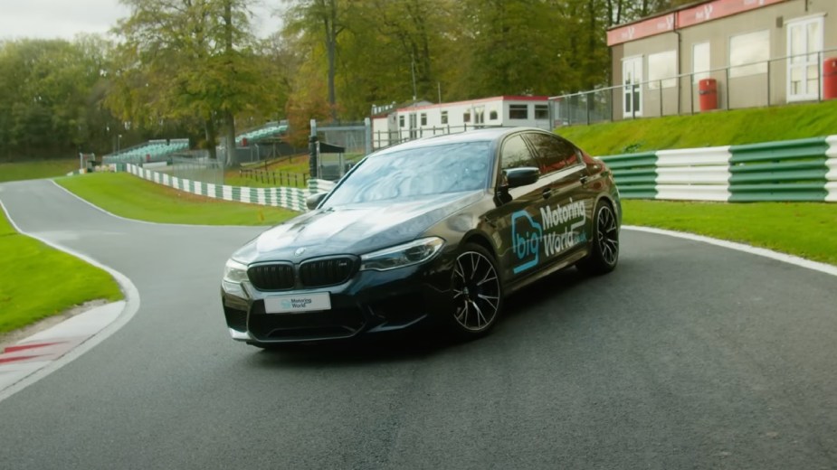 Black BMW M5 Competition, which drove at speeds of 110 mph on Cadwell Park racetrack for job interview