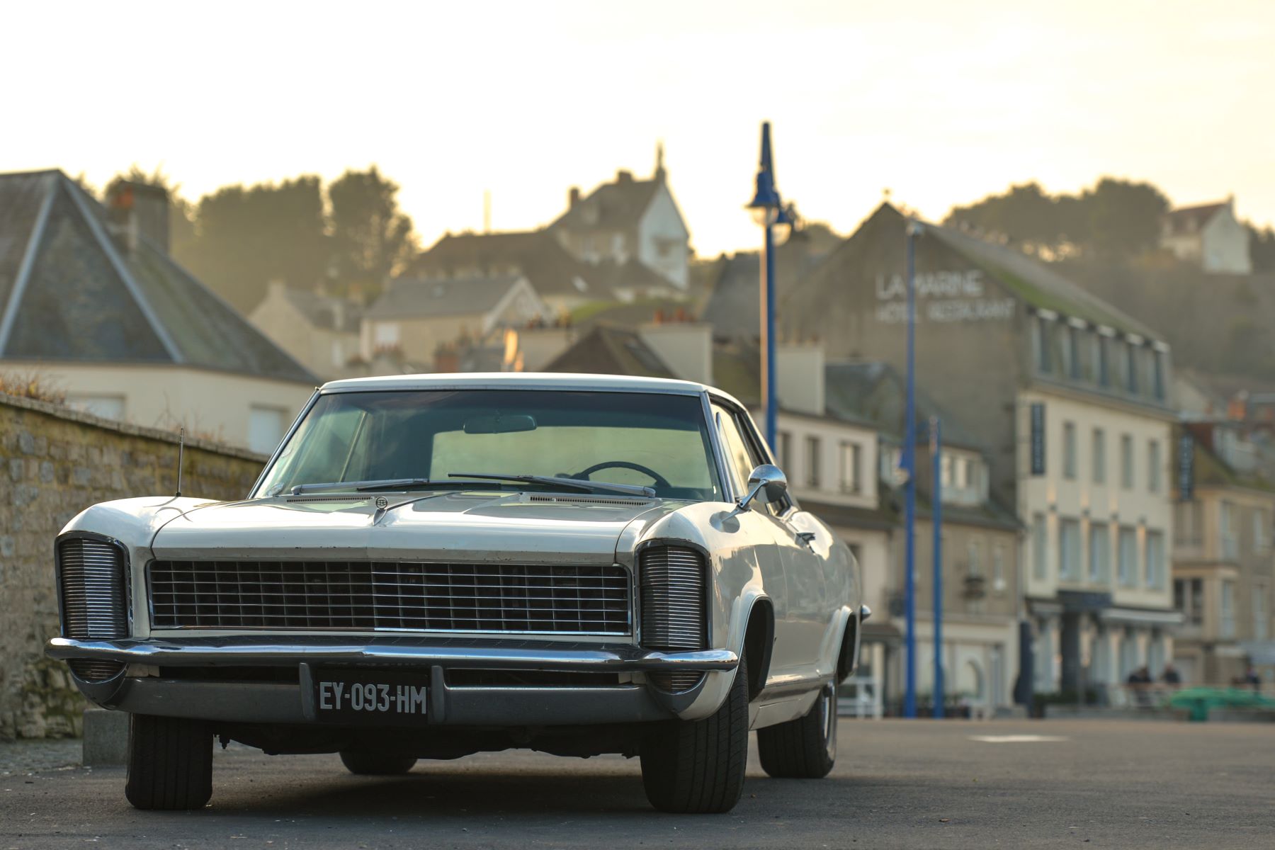 A Buick Riviera model parked at Port-en-Bessin-Huppain in Normandy, France