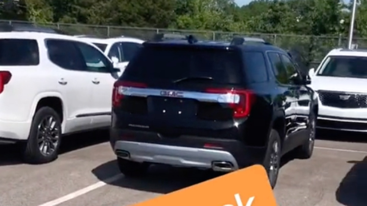 Cars parked in GM lot in TikTok video, showing parking trick that stops car accidents