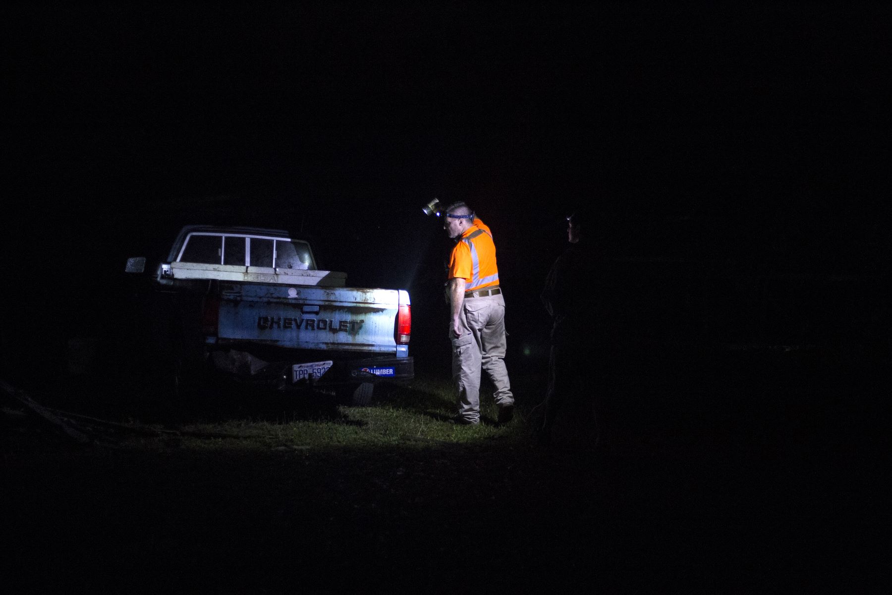 Investigating an abandoned Chevrolet pickup truck in Wilmington, North Carolina