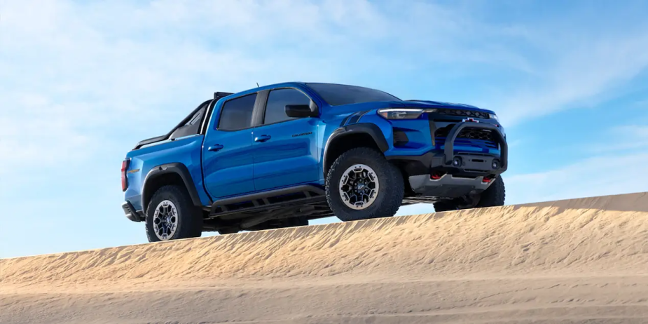 Chevrolet Colorado ZR2 parked on top of a sand dune. 