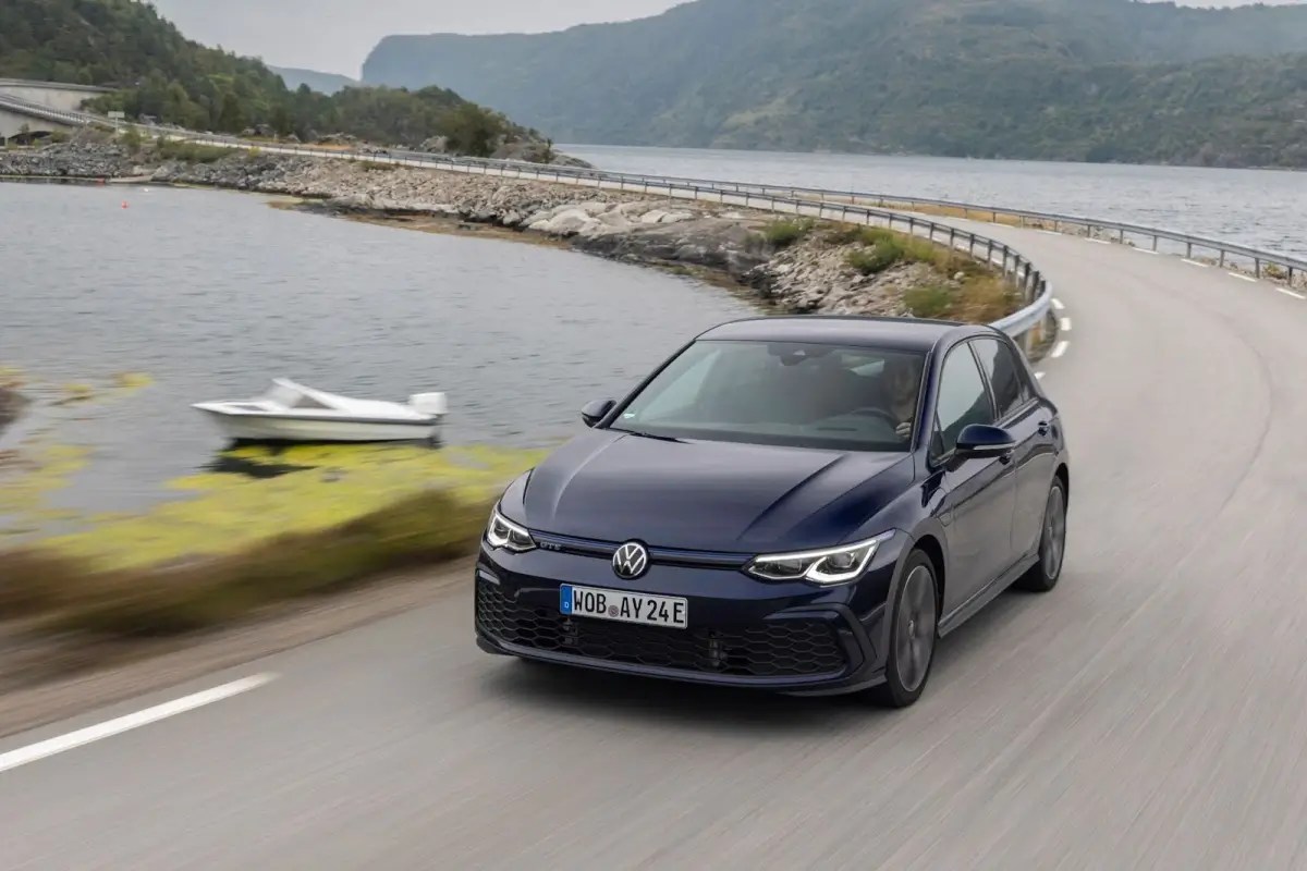 The VW GTE in blue, driving on the right like we do in America.