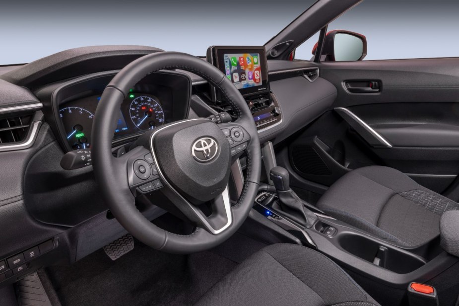 Dashboard in 2023 Toyota Corolla Cross, most affordable new Toyota SUV, offering a new high fuel economy hybrid model