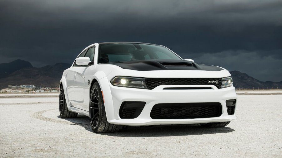 The Dodge Charger SRT Hellcat Widebody shows off its fascia which identifies it as a fast sedan with an SRT engine.