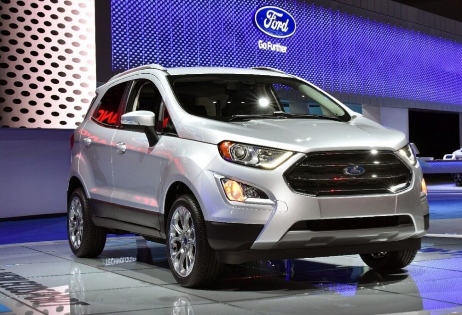 A silver 2022 Ford EcoSport on display at an auto show. 