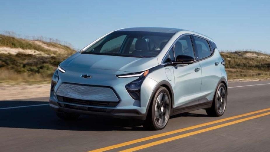 Front angle view of blue 2023 Chevy Bolt EV, the cheapest new electric car
