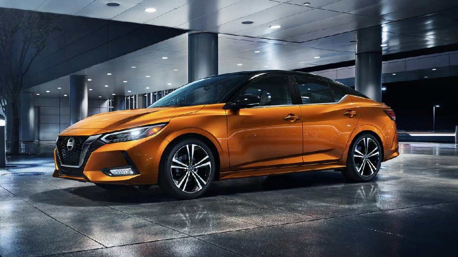 Front angle view of orange 2023 Nissan Sentra compact car