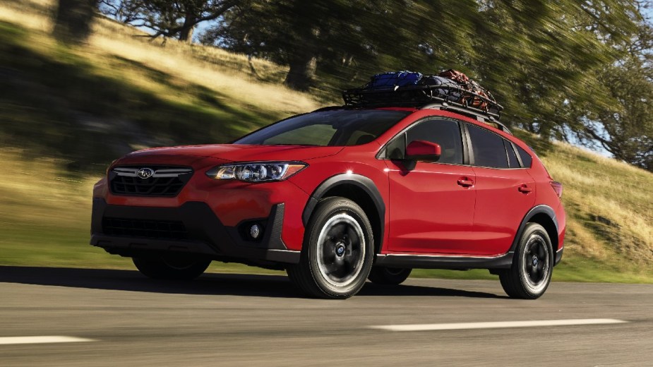 Front angle view of red 2023 Subaru Crosstrek, most reliable Subaru model and best small SUV, says Consumer Reports