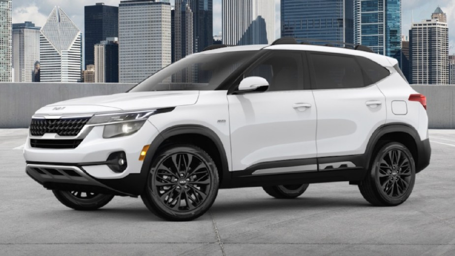 Front angle view of white 2023 Kia Seltos crossover SUV