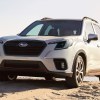 Front angle view of white 2023 Subaru Forester crossover SUV
