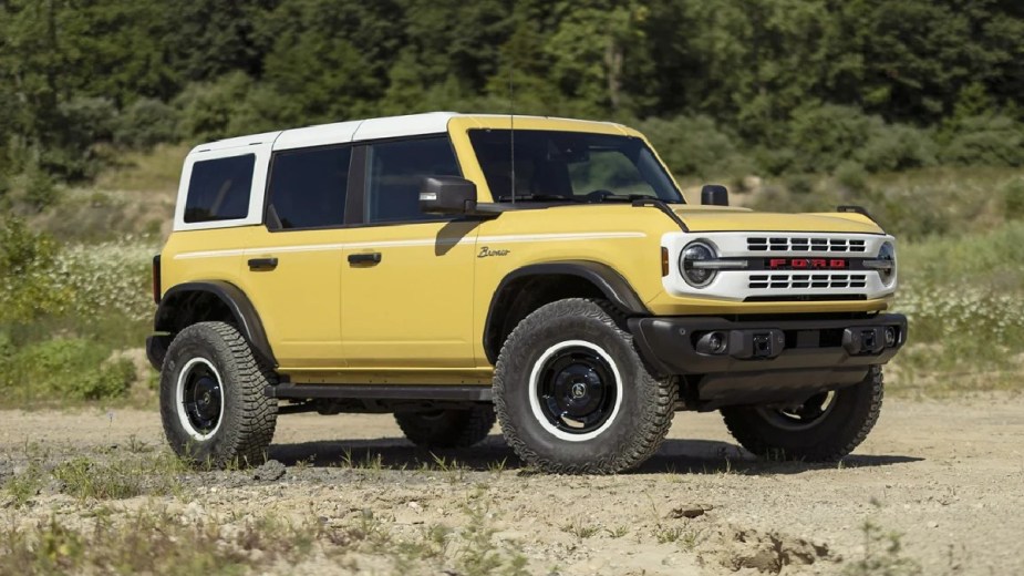 Front view of the yellow 2023 Ford Bronco, 2nd Best New Midsize SUV of 2023 according to Car and Driver