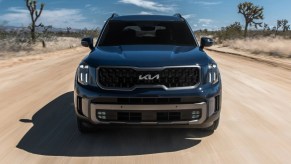 Front view of blue 2023 Kia Telluride, highlighting why Kia cars are so reliable