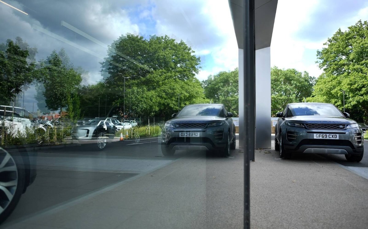 A new Rnage Rover parked at a dealership.