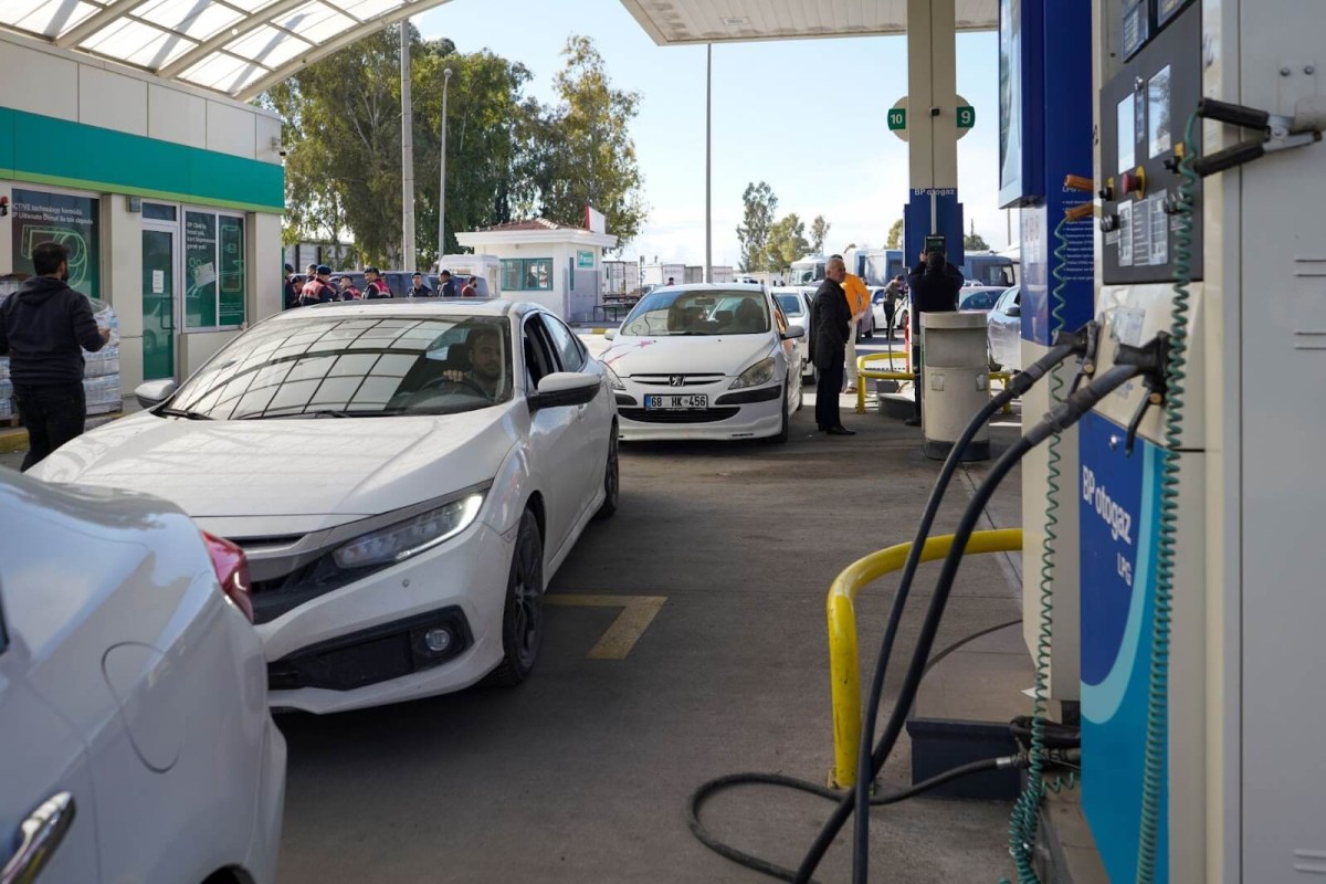 Cars lining up at a fuel pump