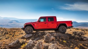 A red 2023 Jeep Gladiator parked outdoors.