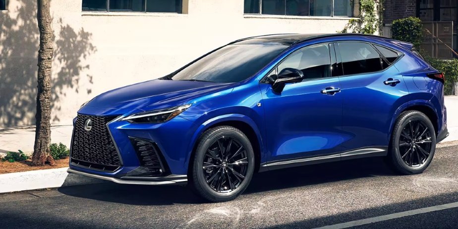 A blue 2023 Lexus NX350h small luxury hybrid SUV is parked. 
