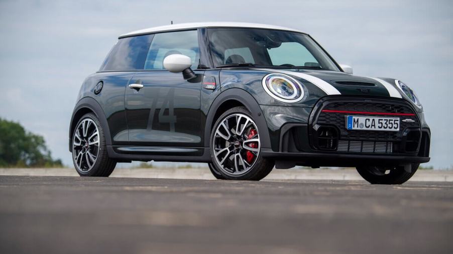 A MINI Cooper John Cooper Works hot hatchback shows off its livery and hatchback styling.