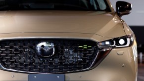 A light brown Mazda CX-5.