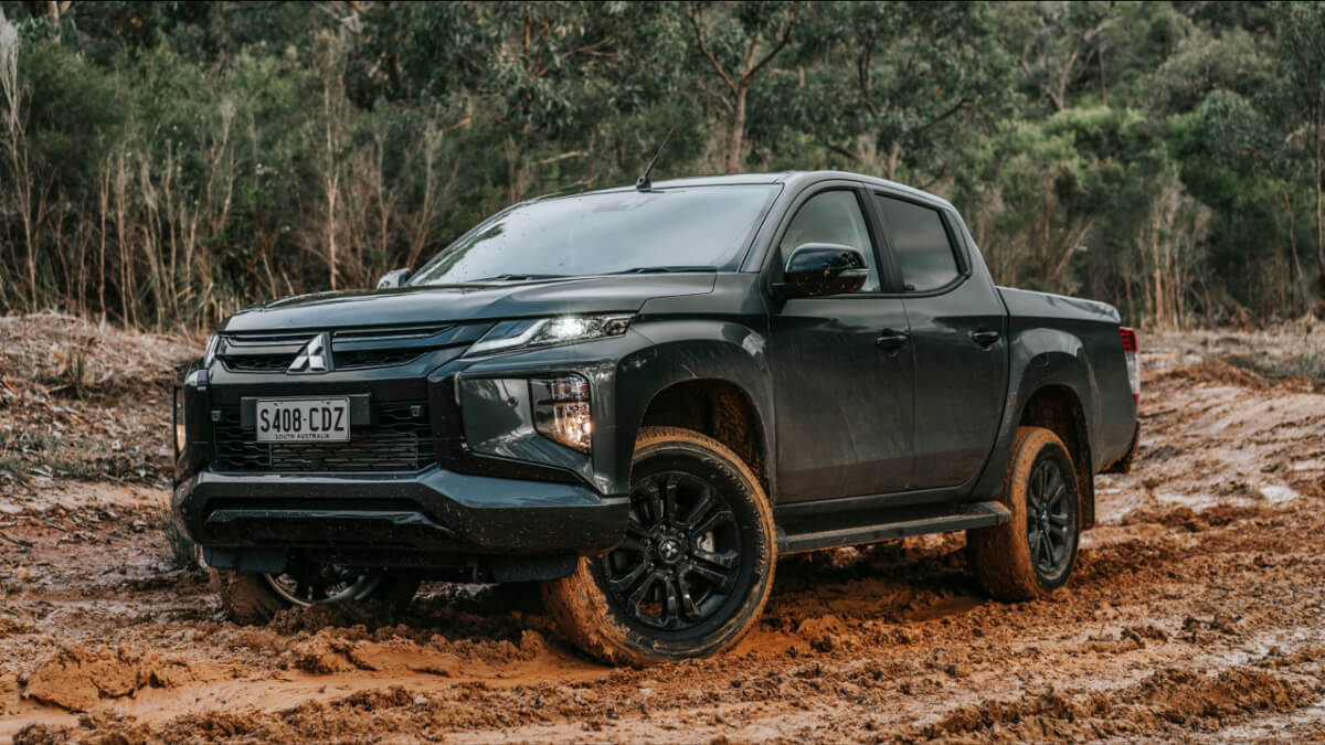 A Mitsubishi Triton sits off-road. A partnership with Nissan could mean a Mitsubishi pickup truck in North America.