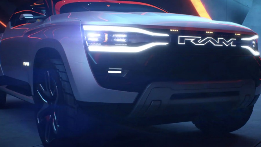 A gray Ram Revolution full-size electric pickup truck concept is parked.