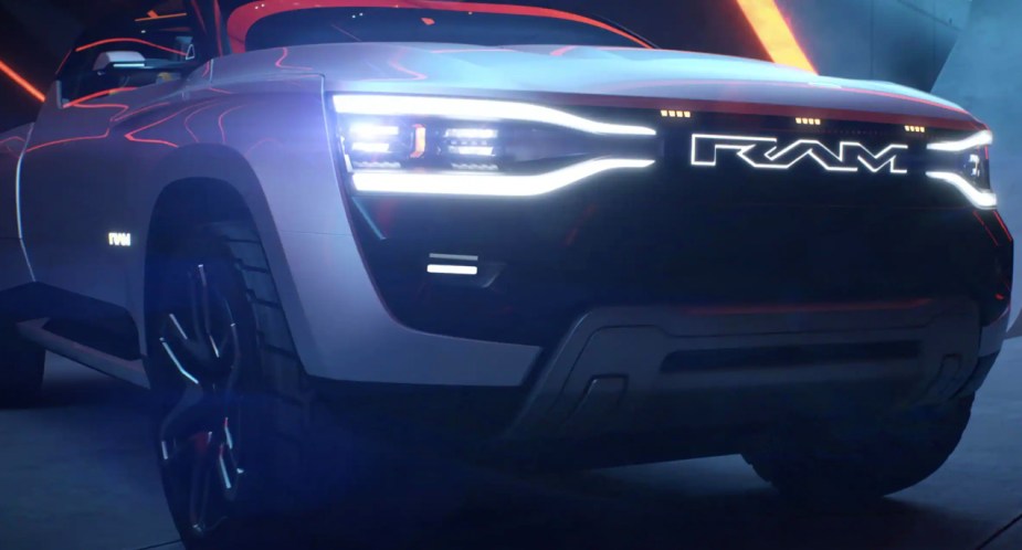 A gray Ram Revolution electric pickup truck concept is parked. 