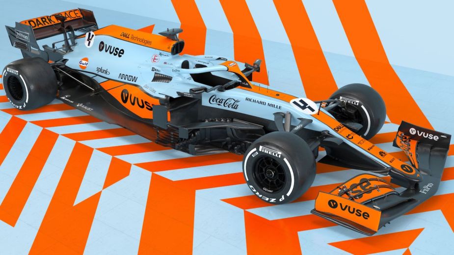 A modern Formula 1 car wearing special edition Gulf Liveries with orange stripes over powder blue.