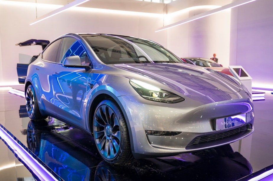 A Tesla Model Y parked indoors. 