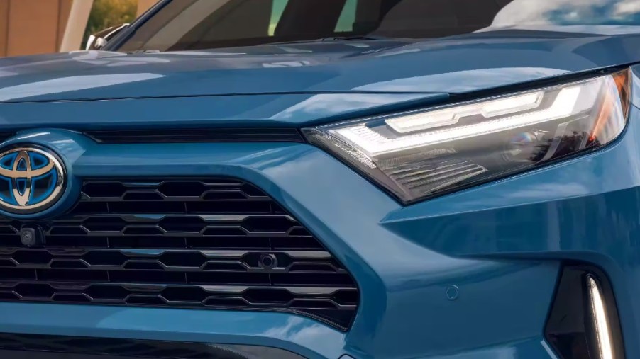The front of a blue 2023 Toyota RAV4 Hybrid small hybrid SUV.