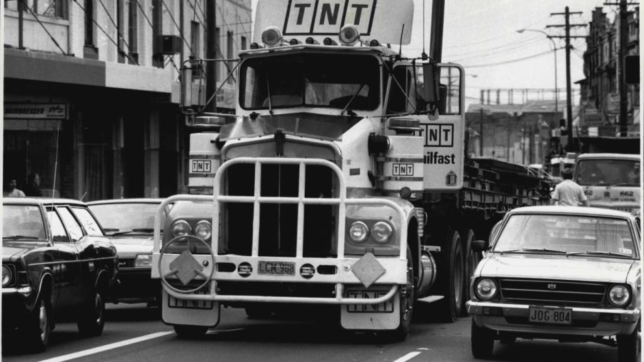 A black-and-white photo of a semi-truck braking accident in Newtown in 1987