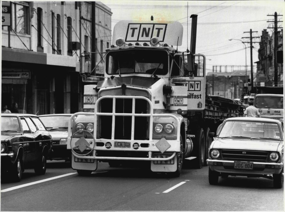 A black-and-white photo of a semi-truck braking accident in Newtown in 1987