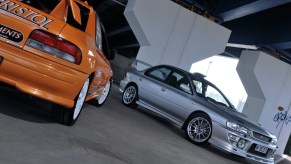 A pair of modified Subarus