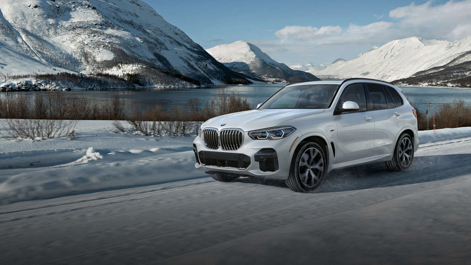 Reliable hybrid SUVs with space include this 2023 BMW X5 in white