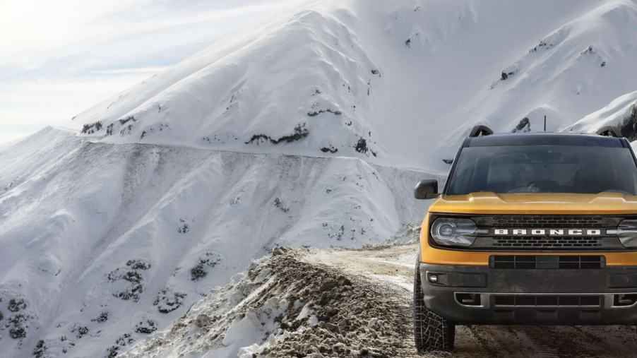 The safe SUVs for new drivers include this yellow 2023 Ford Bronco Sport