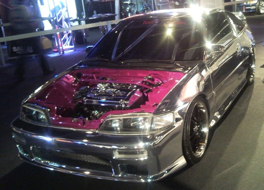 A modified Honda CR-X at a car show.