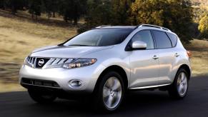A silver-gray 2010 Nissan Murano midsize SUV model