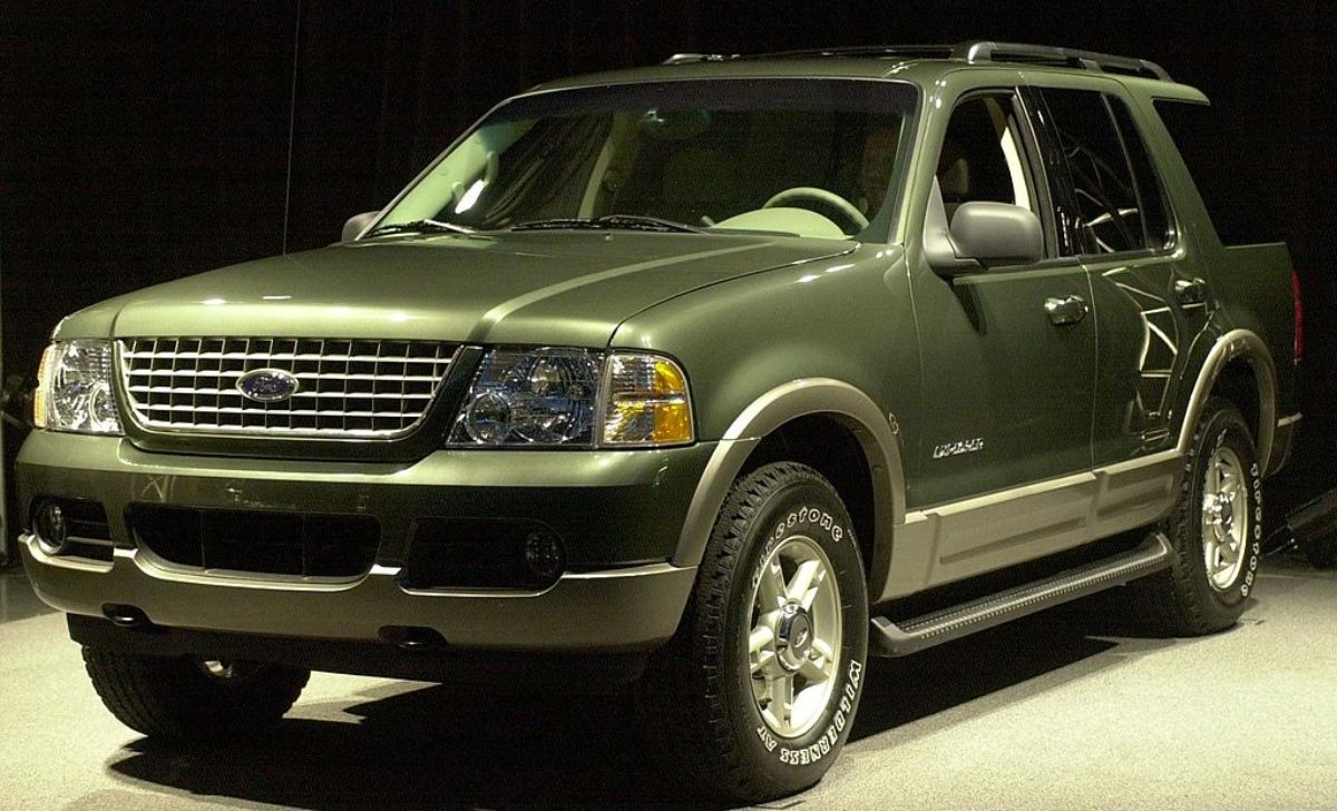 A 2002 Ford Explorer on display at an auto show.