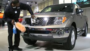 A 2005 Nissan Frontier on display at an auto show. The 2005 model is one of the worst Nissan Frontier models.
