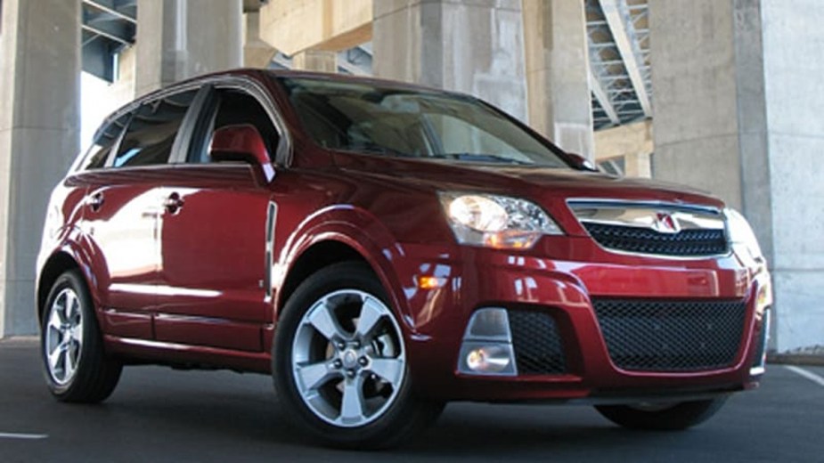Red 2008 Saturn Vue Red Line parked and posed