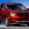A red 2009 Saturn Vue Green Line compact hybrid SUV model at the 2008 North American International Auto show