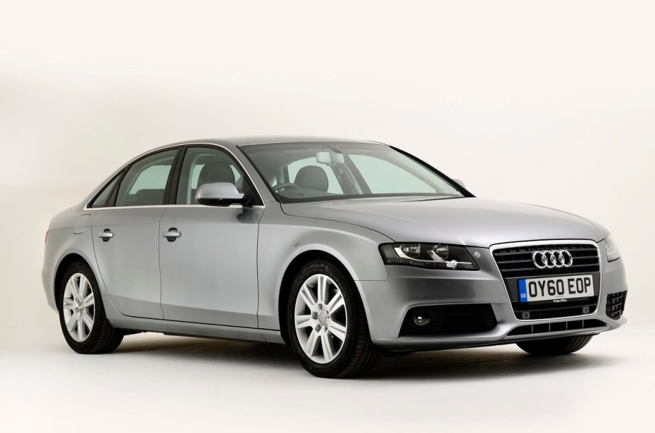 A 2011 Audi A4 used luxury car shows off its reliable, subtle lines and silver paintwork while it poses for a photo shoot. 