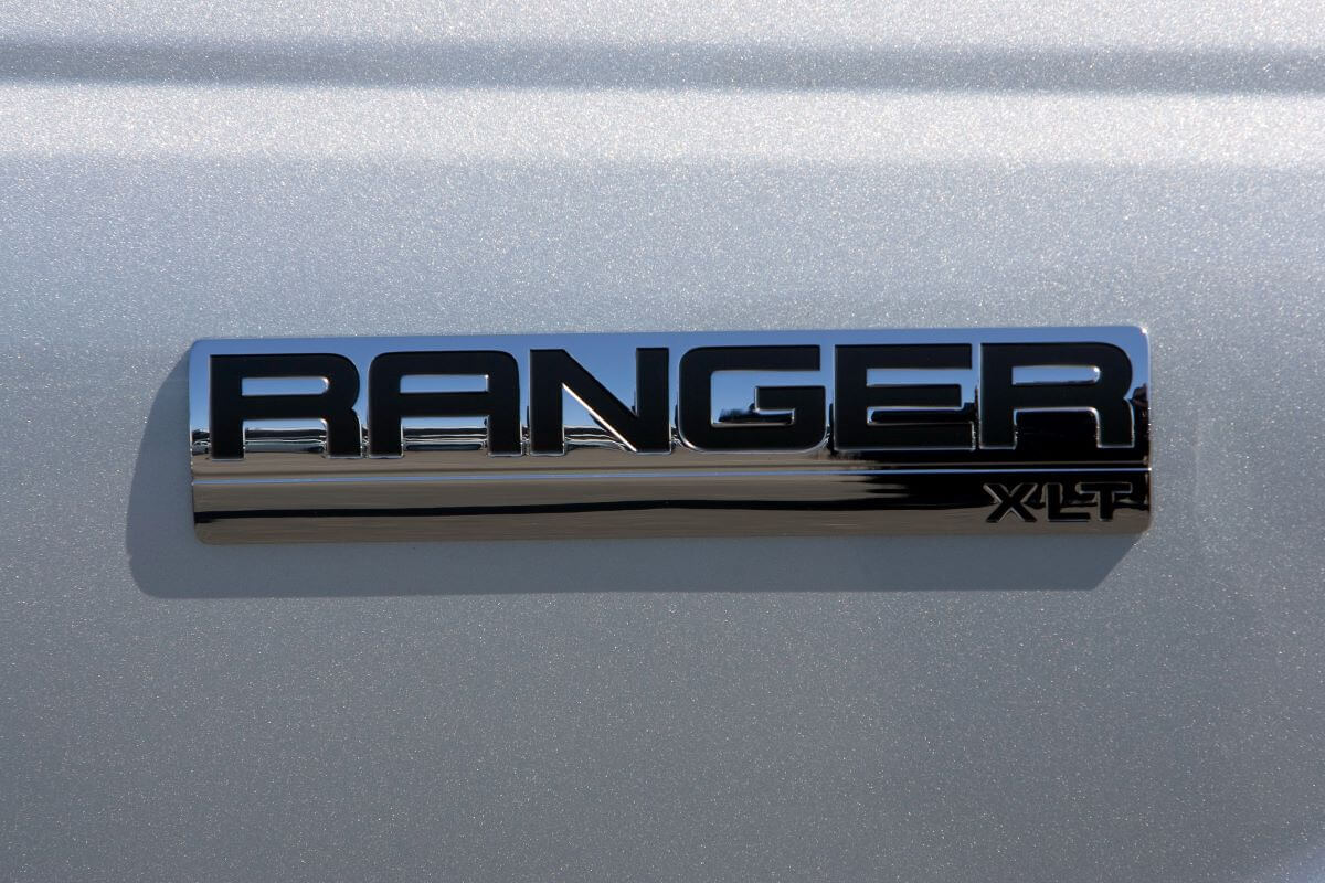 Badging on a white Ford Ranger XLT midsize pickup truck at the Serramonte Ford dealership