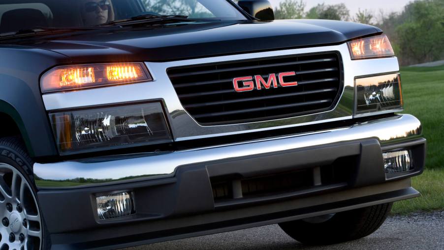 Closeup of the GMC Logo on the grille of a Canyon compact pickup truck