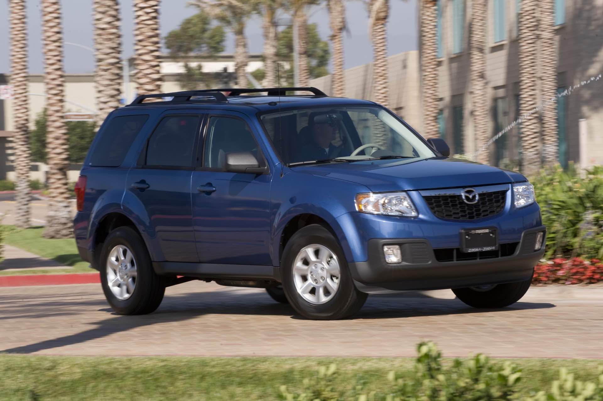 2011 Mazda Tribute in Blue from passenger side