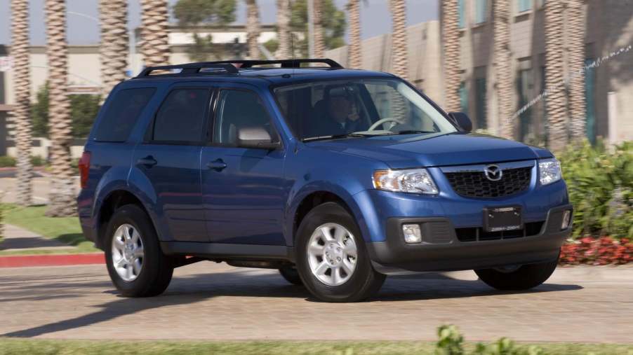 2011 Mazda Tribute in Blue from passenger side