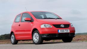 A red 2011 Volkswagen Fox Urban subcompact car model